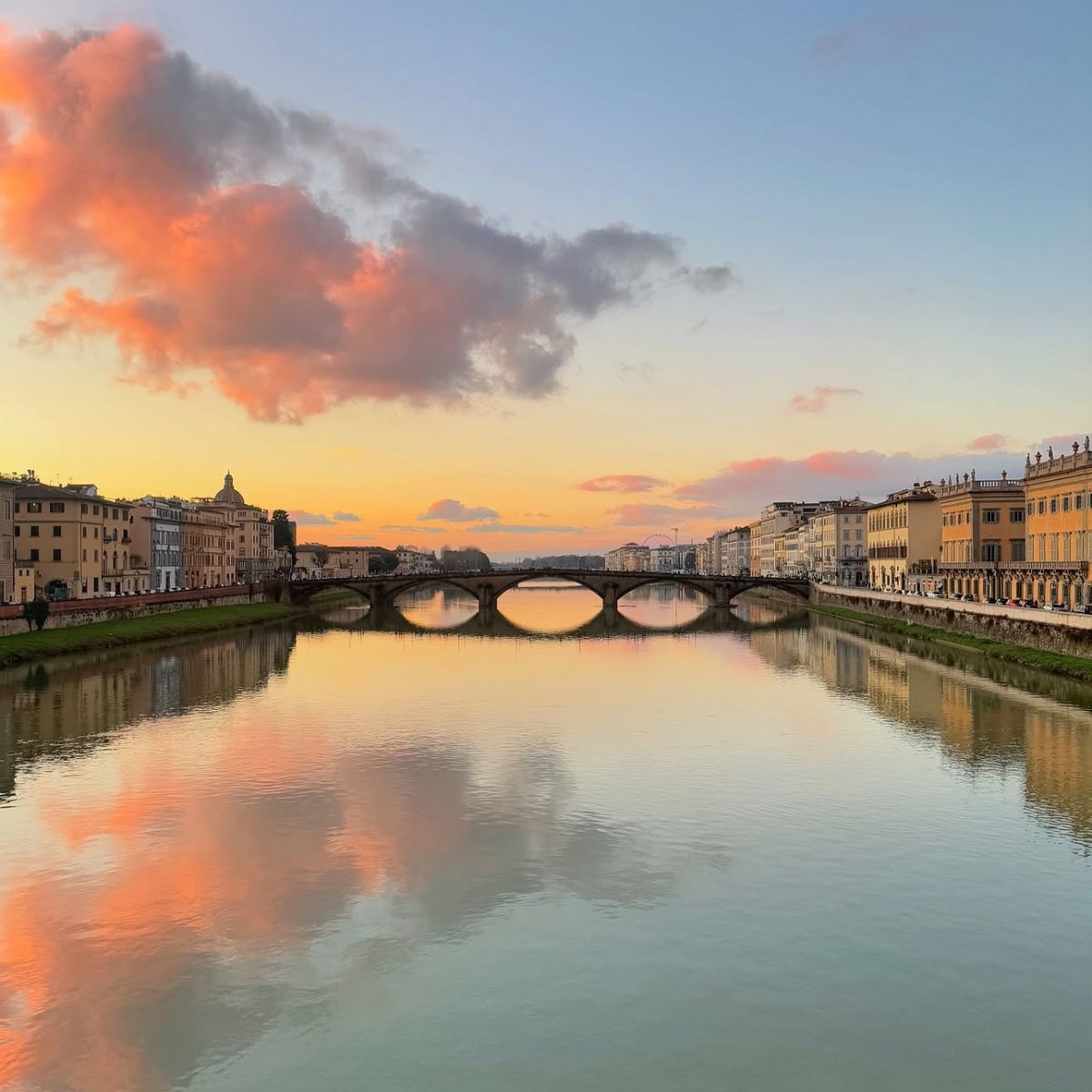 sunset at the arno river in florence