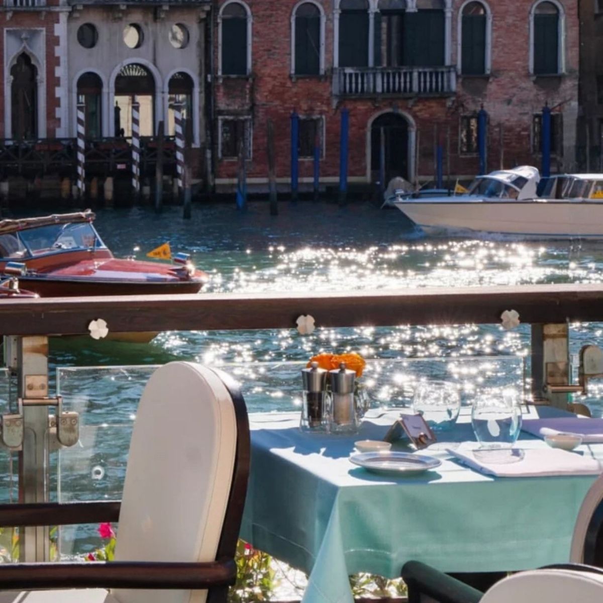 table overlooking the grand canal in venice