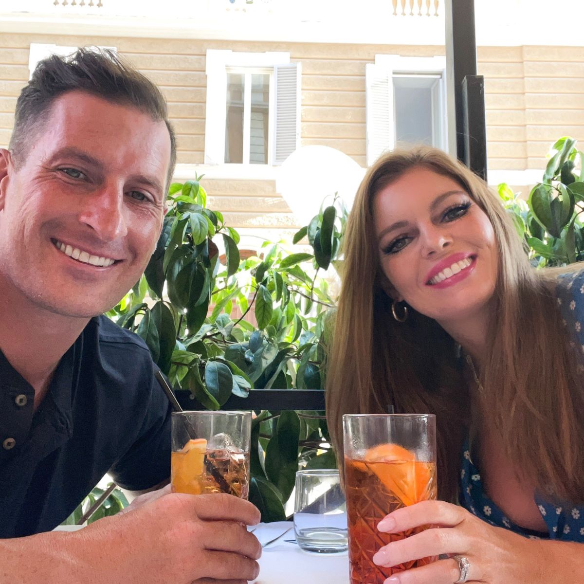 couple enjoying drinks at a restaurant