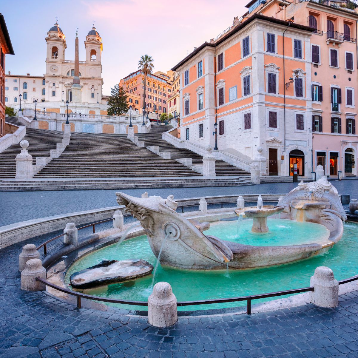 spanish steps in rome with fountain in front