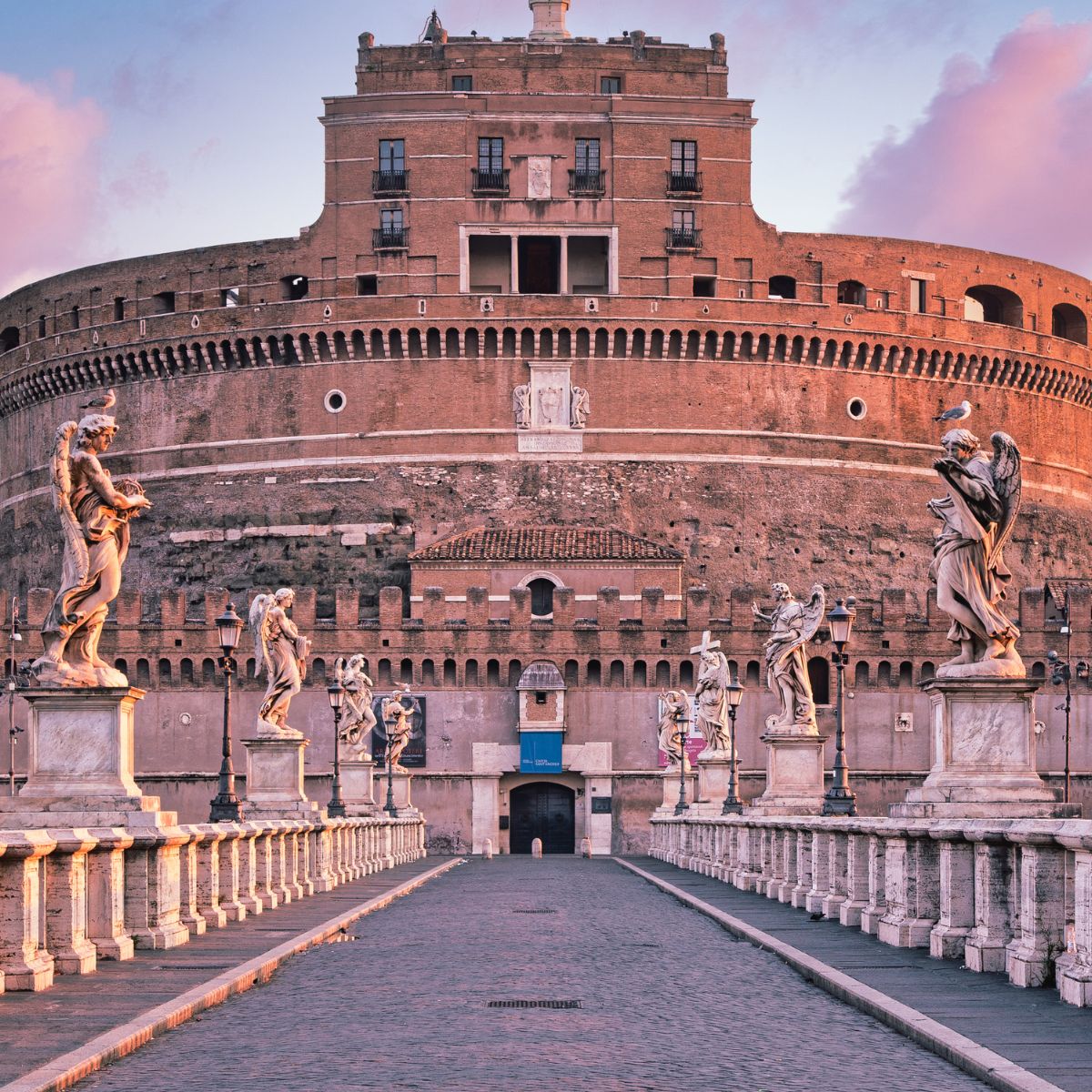 castle in rome with bridge in front