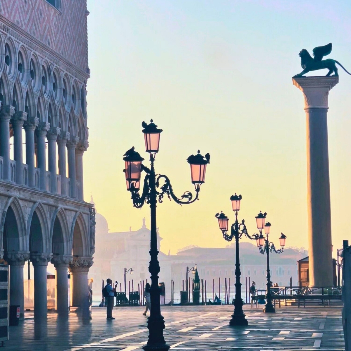 sunrise at St. Mark's Square with the Doge's Palace in the foregroud
