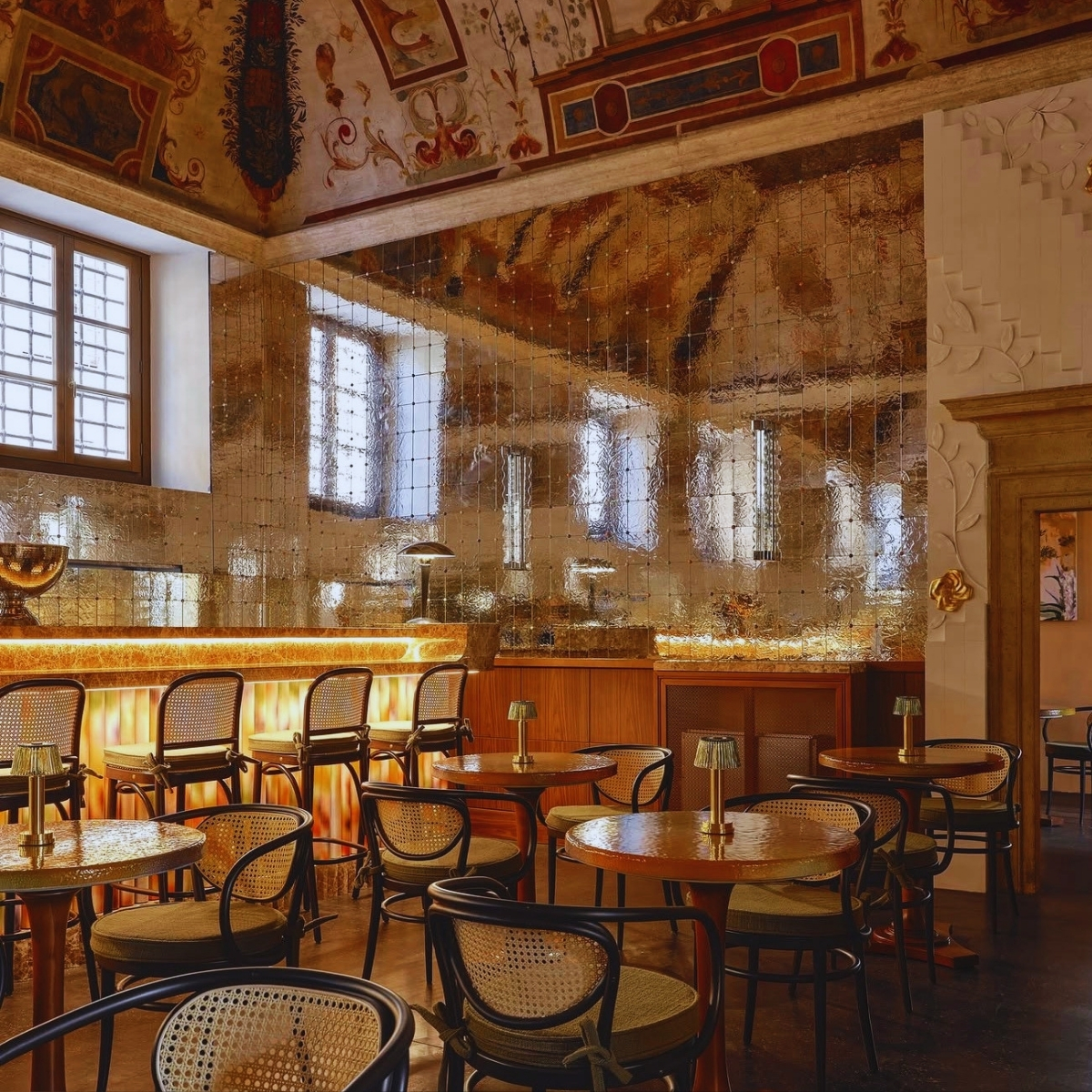 Luxurious hotel lounge featuring marble walls at Palazzo Talia Rome