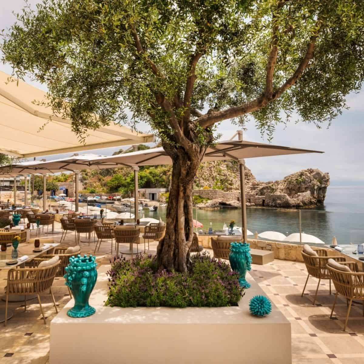 Mazzarò Sea Palace VRetreats beachfront hotel dining terrace overlooking bay Taormina Sicily